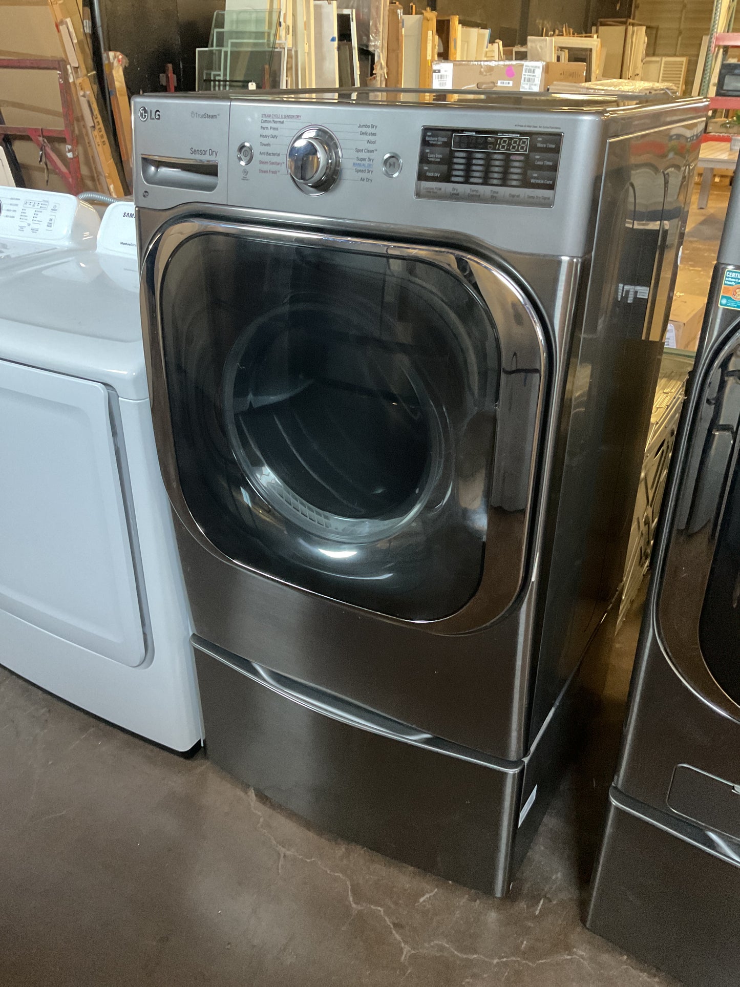 LG Electric Front Load Washer & Dryer Combo w/Pedestal