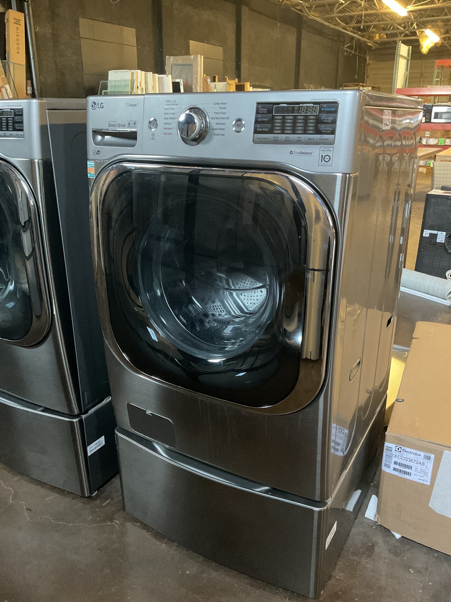 LG Electric Front Load Washer & Dryer Combo w/Pedestal